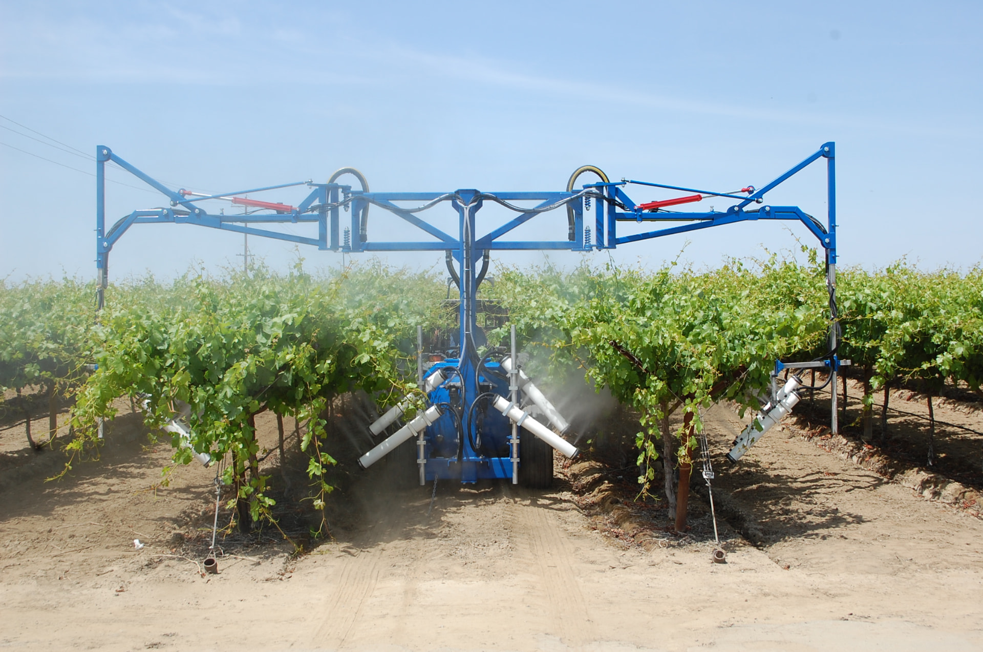 OnTarget two-row overhead boom sprayer covering table grape trellises